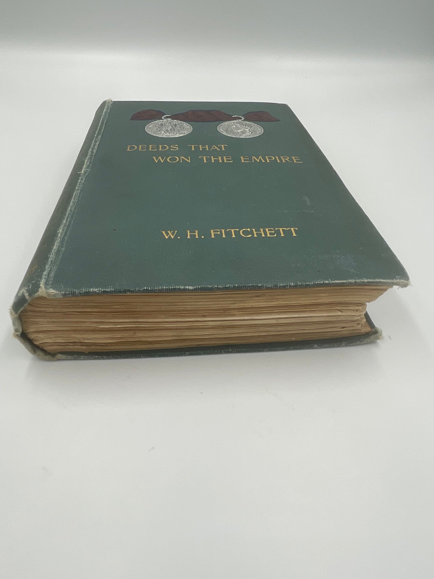 Book pages edge view of ‘Deeds That Won The Empire’ by W.H.Fitchett