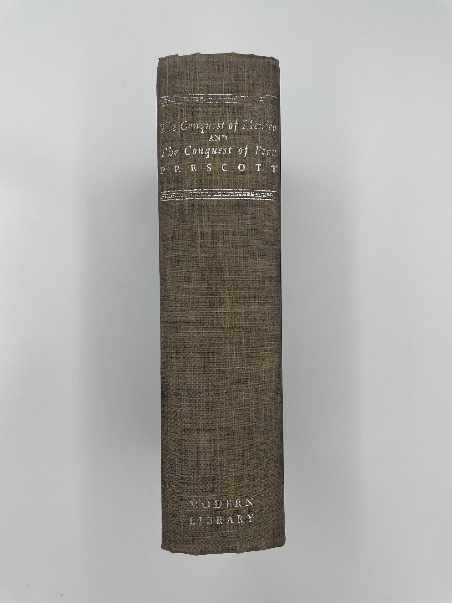 Book spine of "The Conquest of Mexico and The Conquest of Peru" by William H. Prescott
