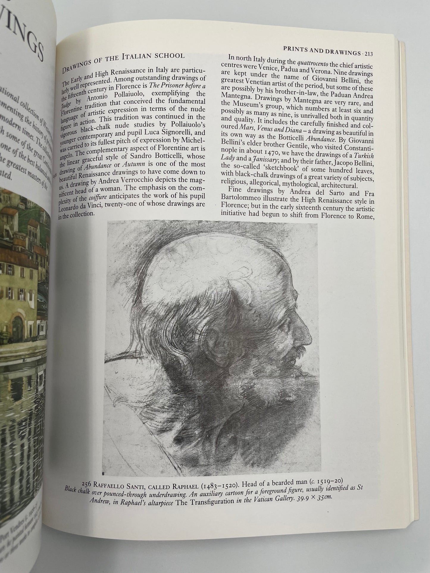 Open book with a black and white illustration of a head on a white background