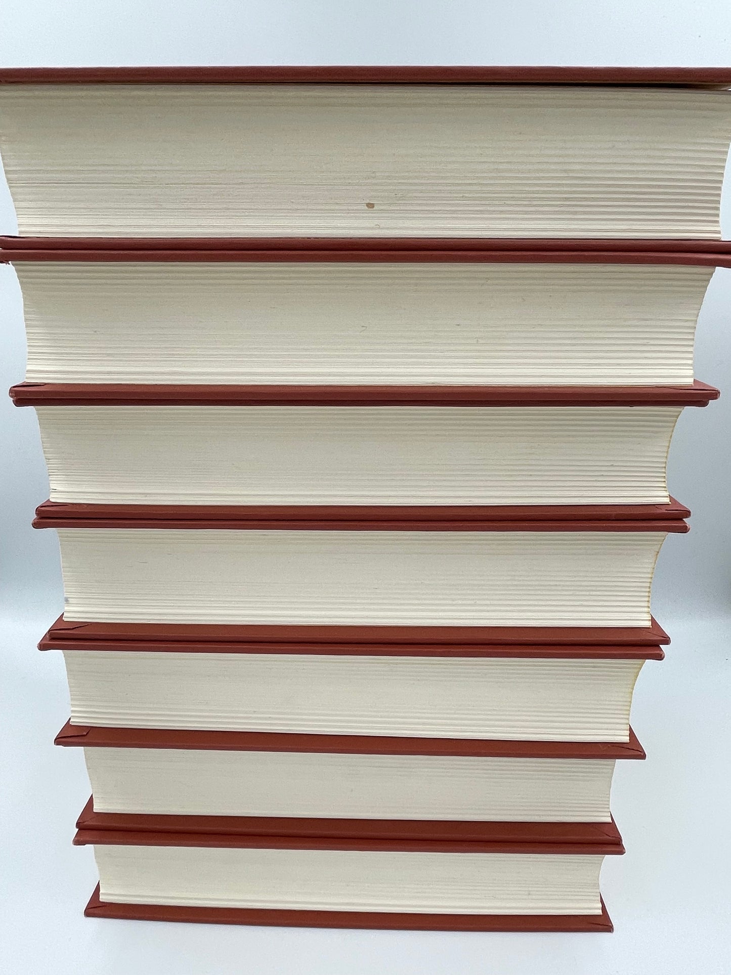 Books stacked with edges showing.