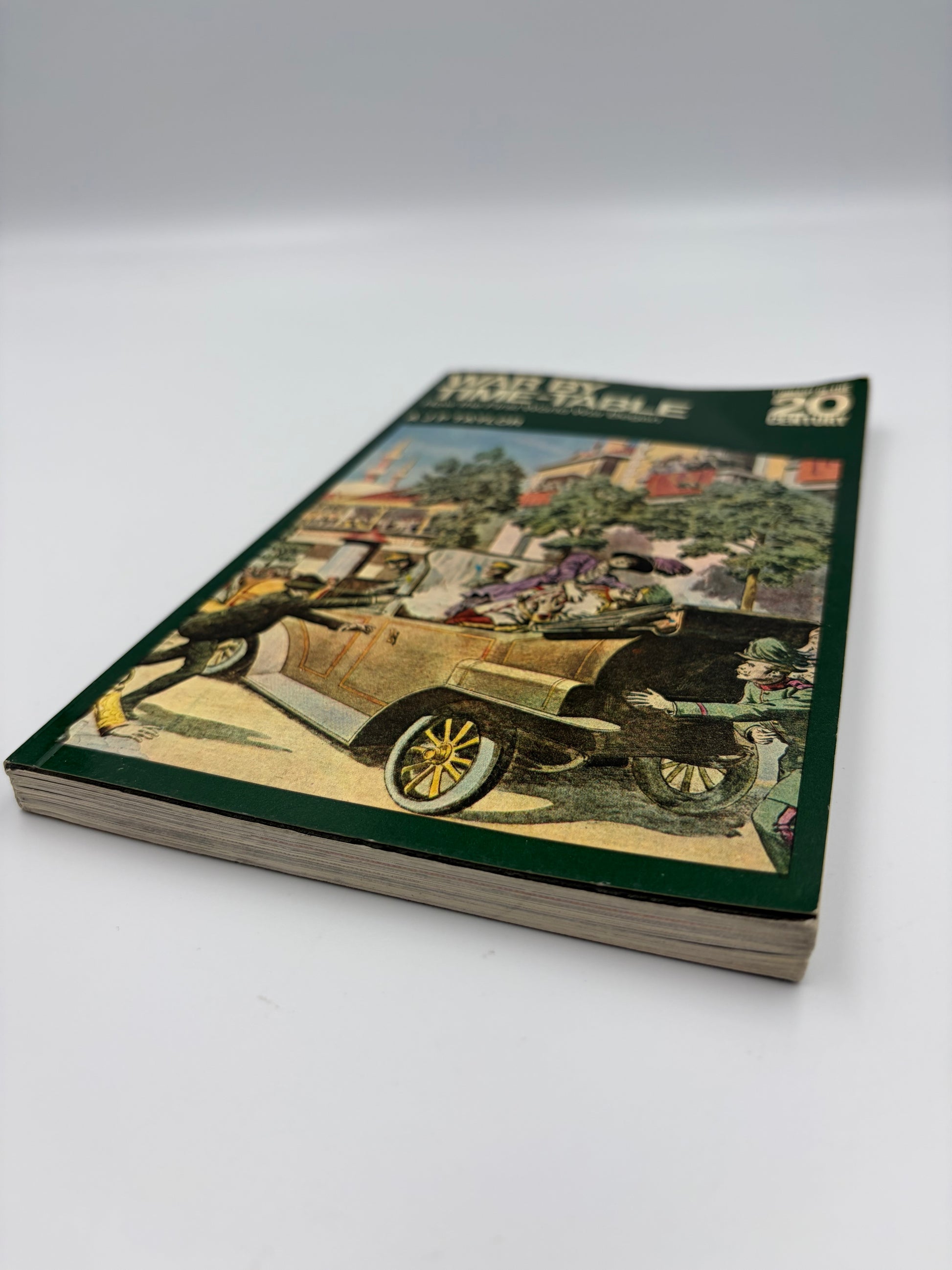 Booklet cover with illustration of First World War era car. 