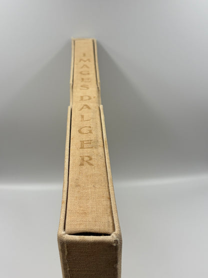 A close-up shot of hardcover portfolio spine, showing the title 'IMAGES DALGER' on original 1948 cloth binding against a neutral gray background.