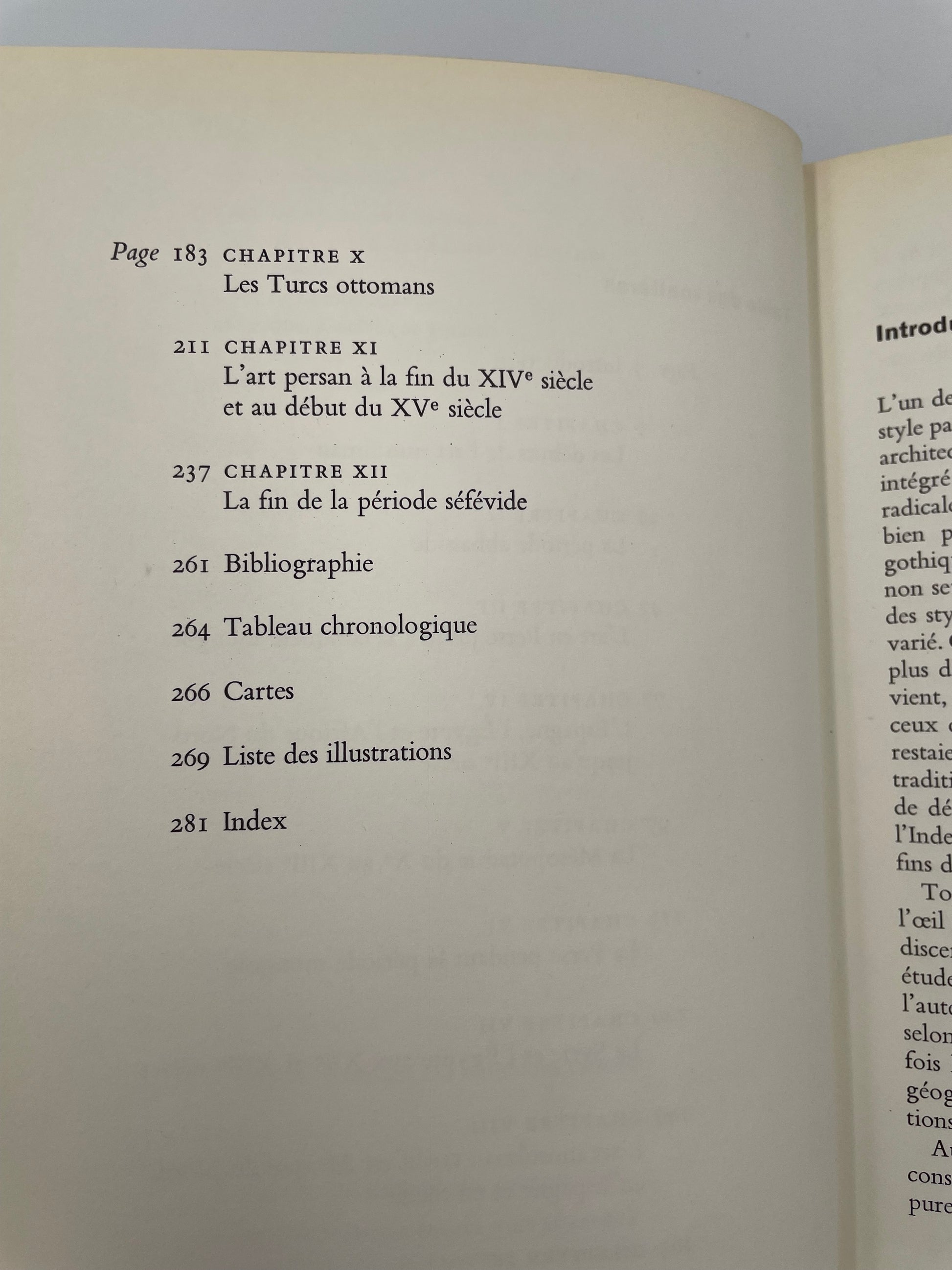 Open book with text on a gray background