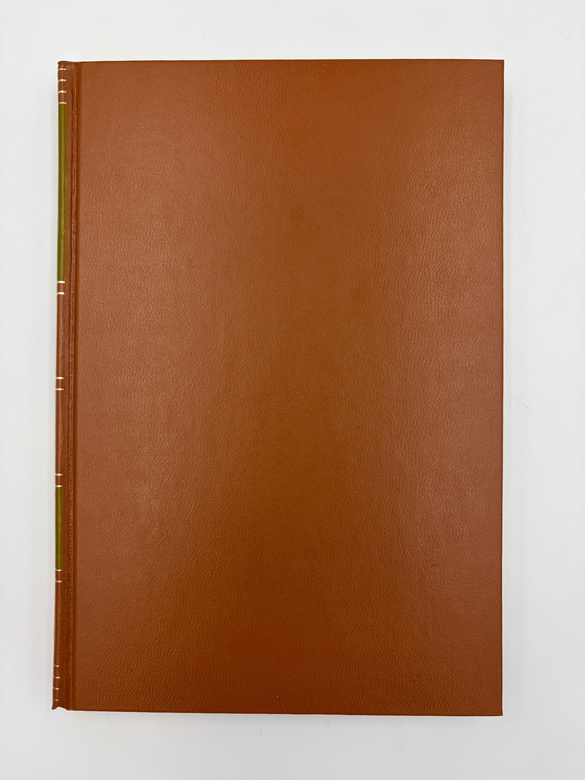A brown leather-bound edition of ‘Moby-Dick; or, The Whale’ by Herman Melville.