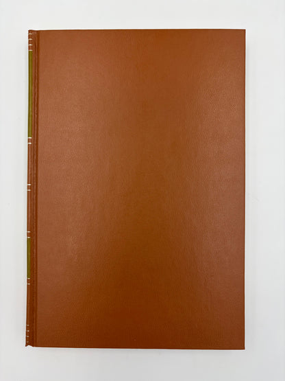 A brown leather-bound edition of ‘Moby-Dick; or, The Whale’ by Herman Melville.