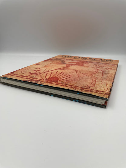 Side view of book, 'The Etruscans' by Mauro Cristofani.