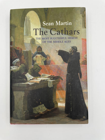 Book titled 'The Cathars: The Most Successful Heresy of the Middle Ages' by Sean Martin on a white background