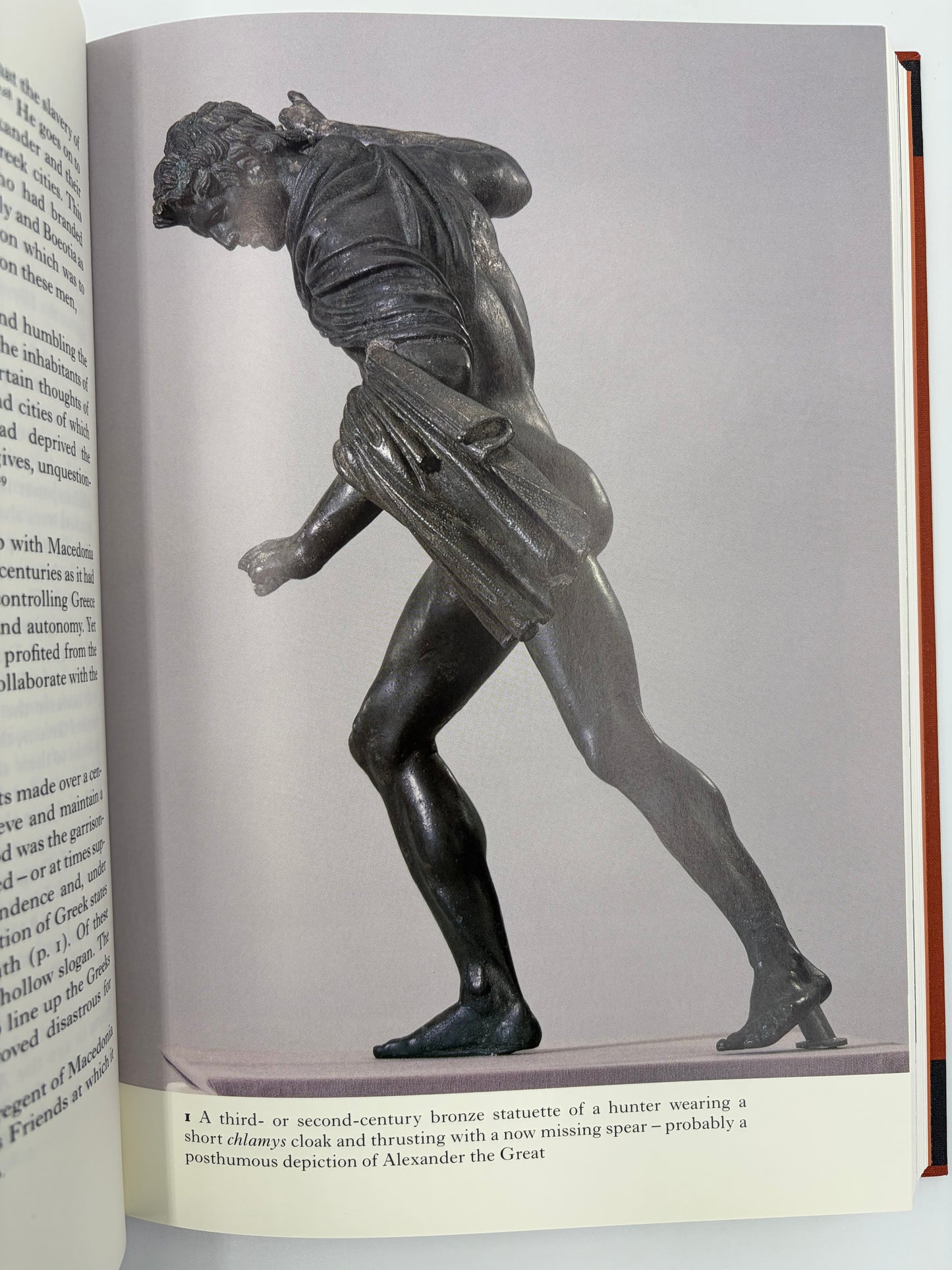 Illustration of a bronze statue of a hunter from The Folio History of Ancient Greece: The Hellenistic Age.