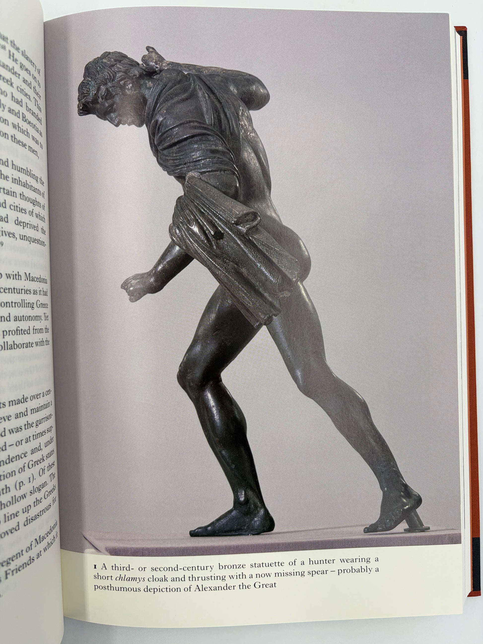 Illustration of a bronze statue of a hunter from The Folio History of Ancient Greece: The Hellenistic Age.