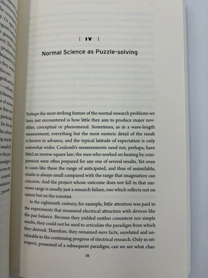 Chapter 4 titled 'Normal Science as Puzzle-solving' from the book, 'The Structure of Scientific Revolutions' by Thomas S. Kuhn.