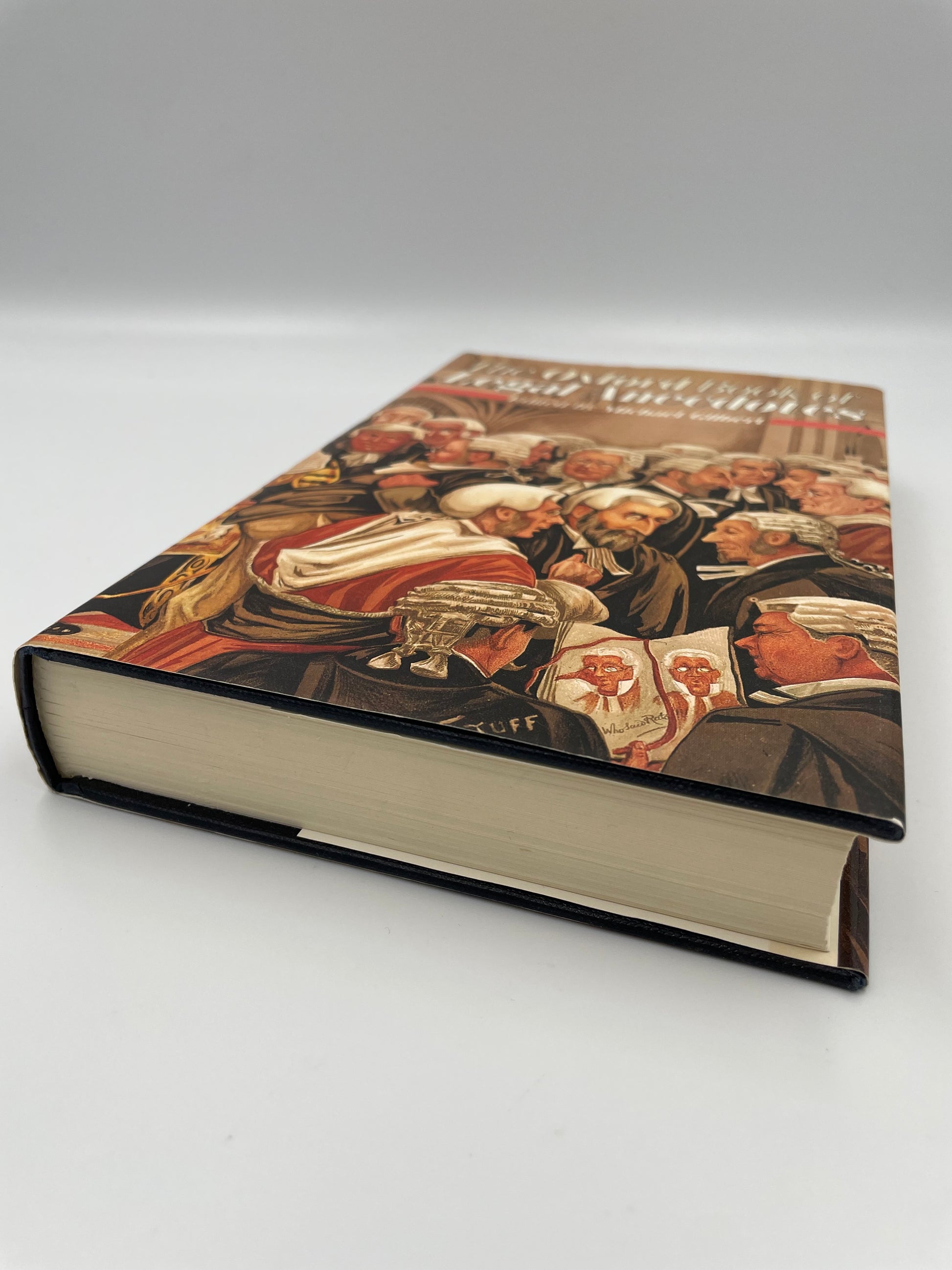 Side angle view of the book 'The Oxford Book of Legal Anecdotes'.