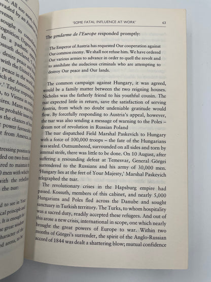 Open book with text on a white background. Random page from ‘ A Brief History of the Crimean War´ by Alexis Troubetzkoy