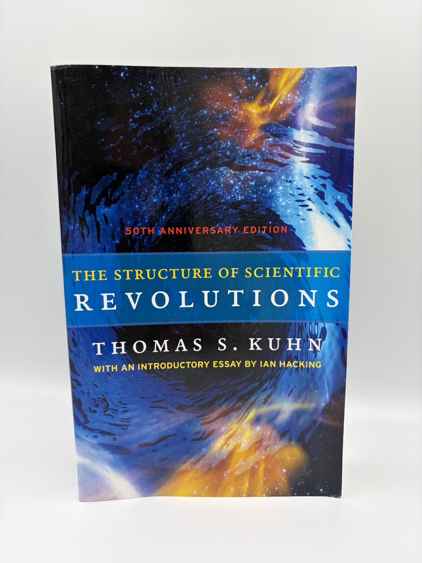 Book cover of 'The Structure of Scientific Revolutions' by Thomas S. Kuhn on a white background.