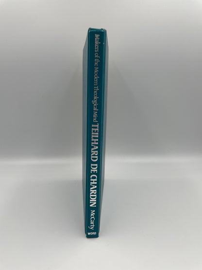 Book titled 'Teilhard de Chardin' on a white background