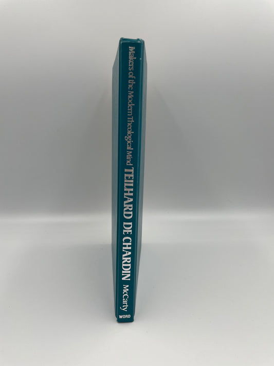 Book titled 'Teilhard de Chardin' on a white background