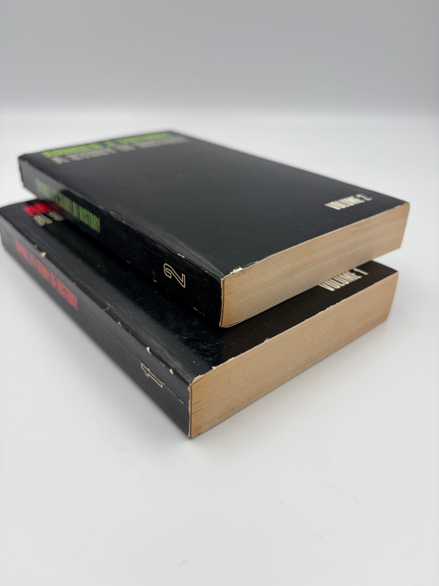 ‘A Study of History’ by Arnold J.Toynbee - 2 Volume Abridged Set Books stacked on one another 