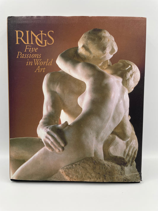 Book cover with sculpture of two figures on a brown background from Rings: Five Passions in World Art