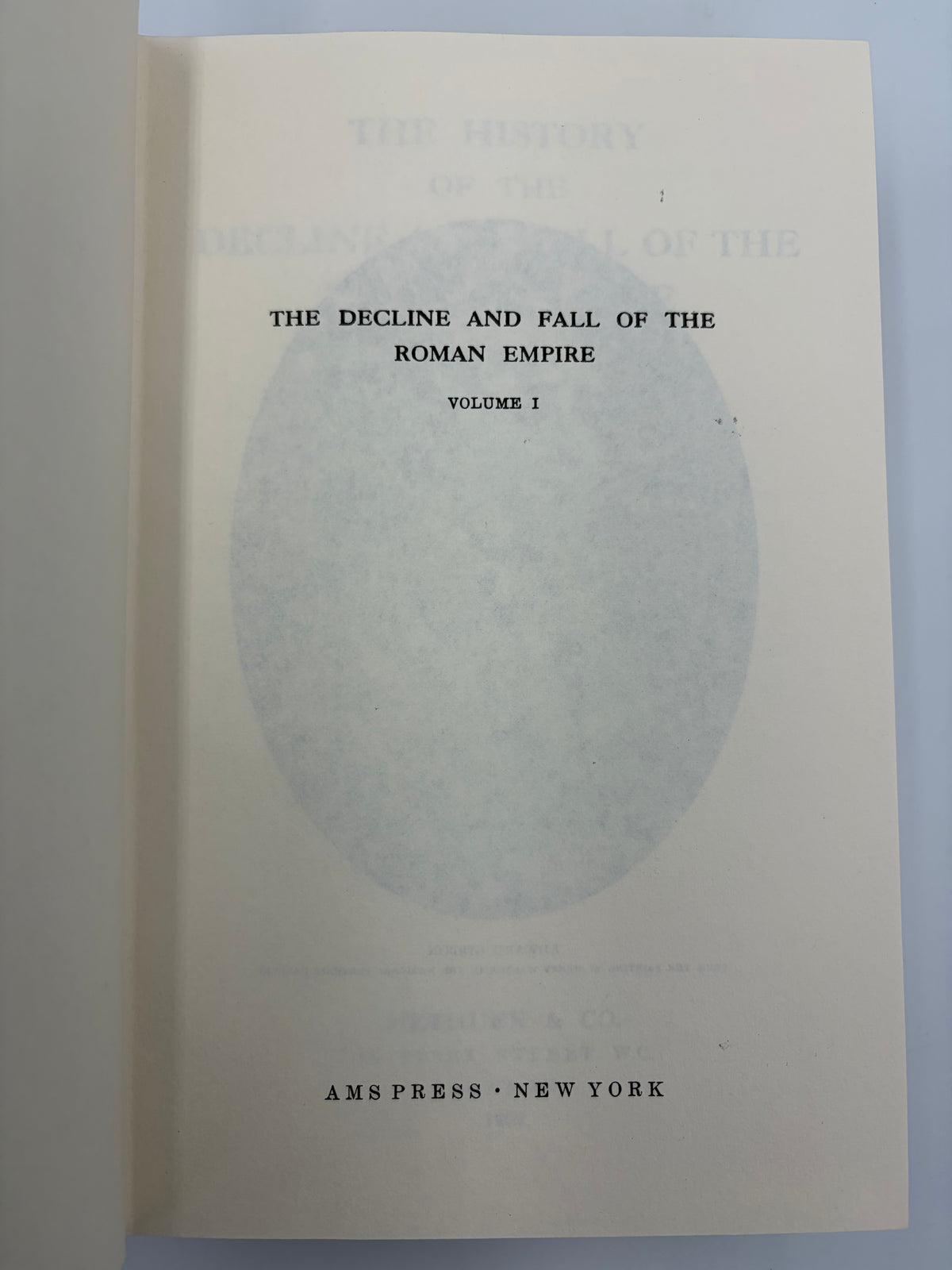 A book page from 'The Decline and Fall of the Roman Empire, Volume 1' showing the title and publisher 'Ams Press New York' on aged off-white paper.