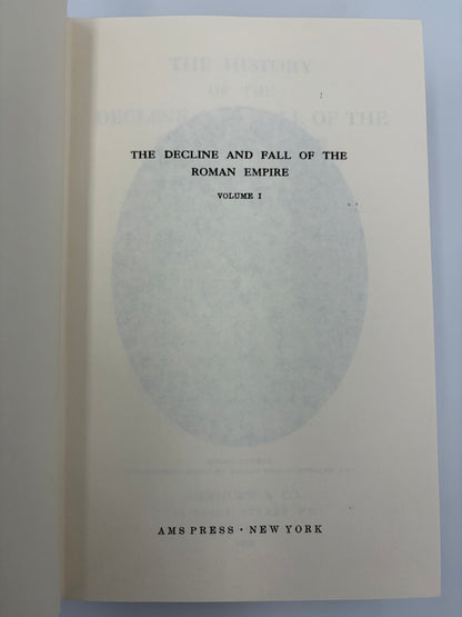A book page from 'The Decline and Fall of the Roman Empire, Volume 1' showing the title and publisher 'Ams Press New York' on aged off-white paper.