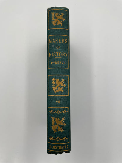 Book spine of  ‘Makers of History: Pyrrhus’ by Jacob Abbott with decorative gold text and designs on a white background