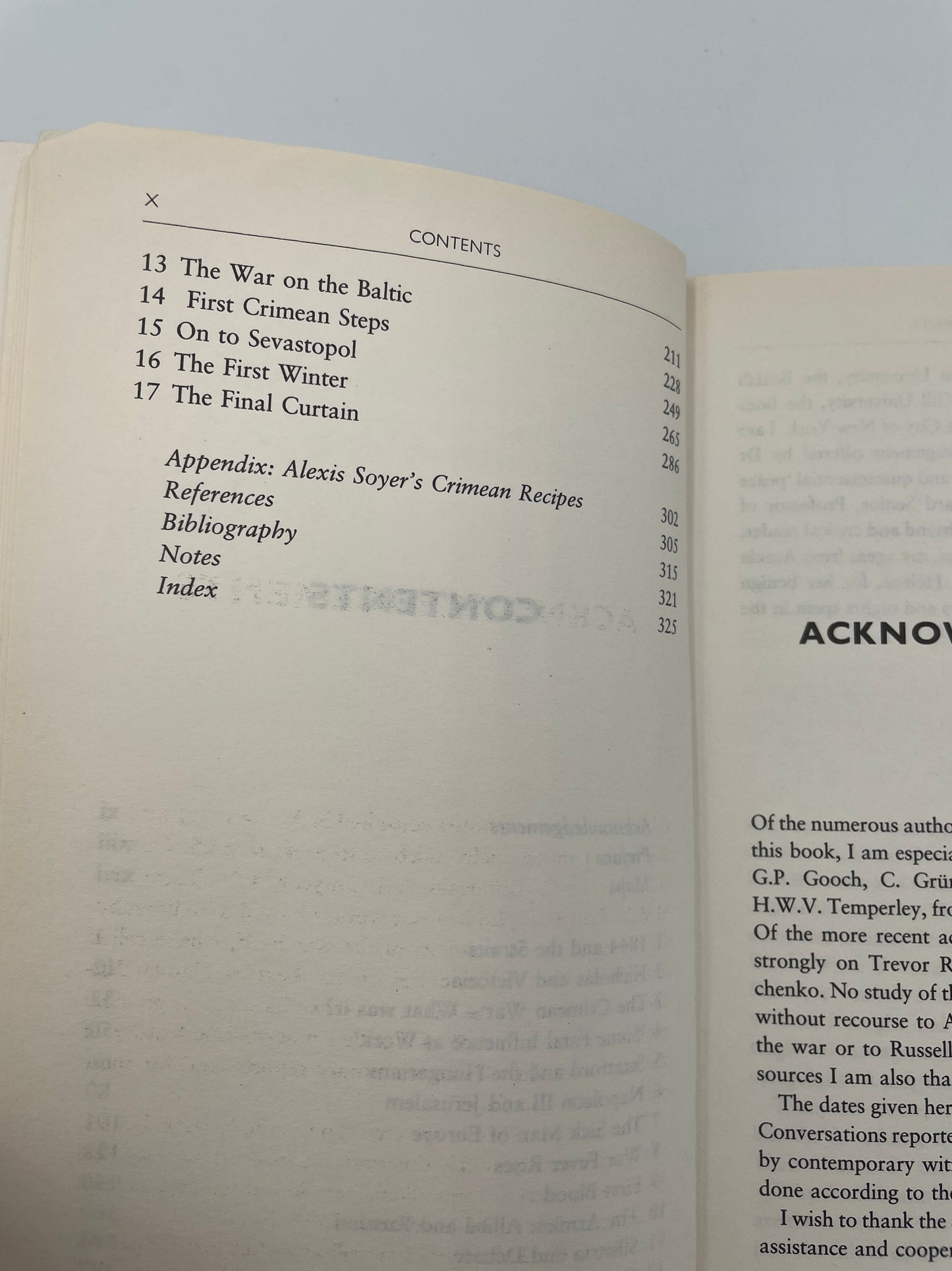 Open book showing a content page and acknowledgment with text on a light gray background from n A Brief History of the Crimean War’ by Alexis Troubetzkoy