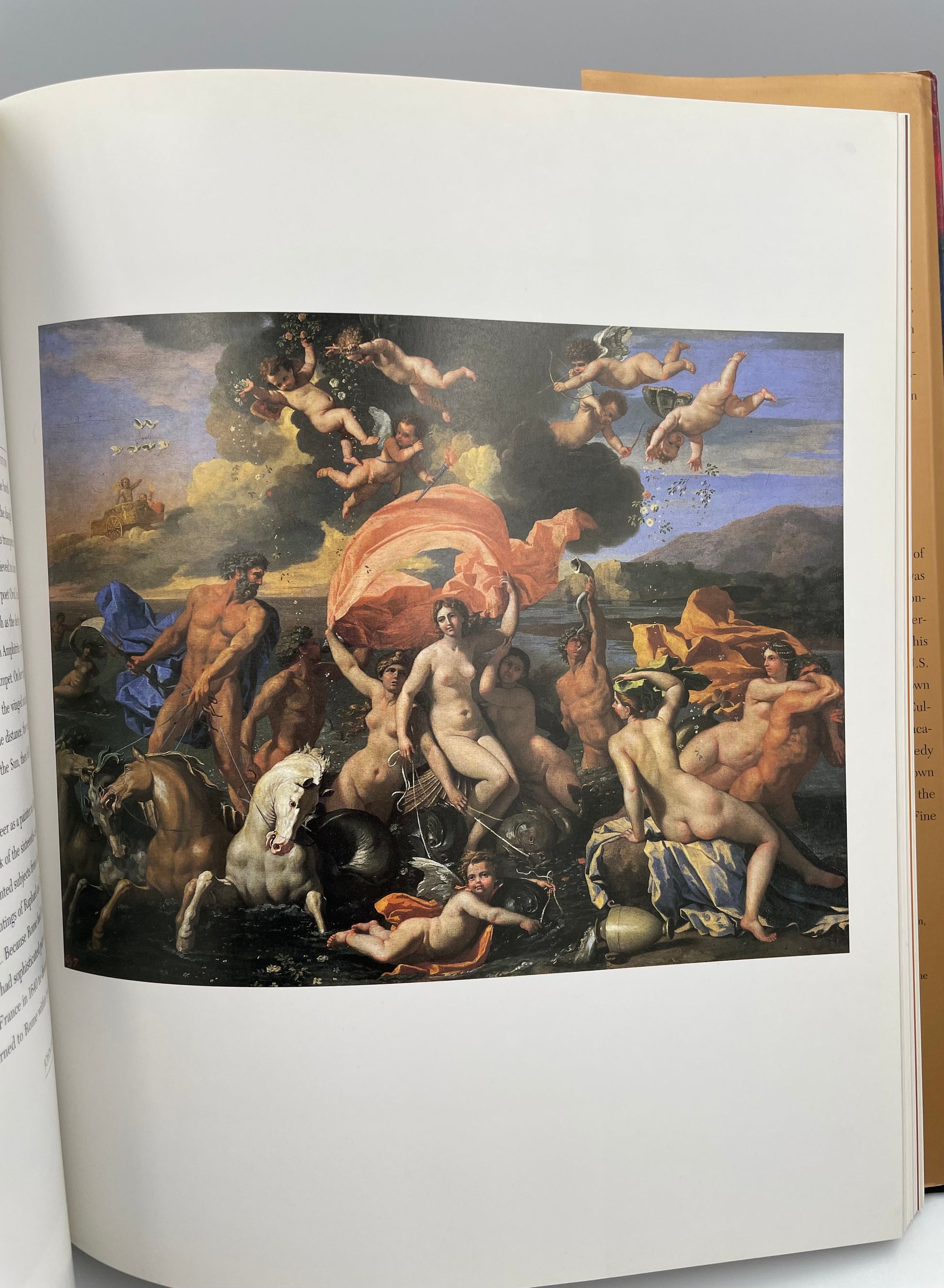 Open book with a classical painting of  figures on a landscape.