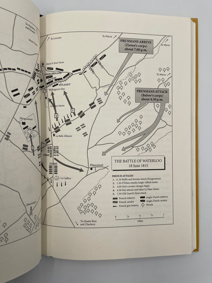Open book with a map of the Battle of Waterloo on a white background from book, 'Waterloo' by Andrew Roberts.