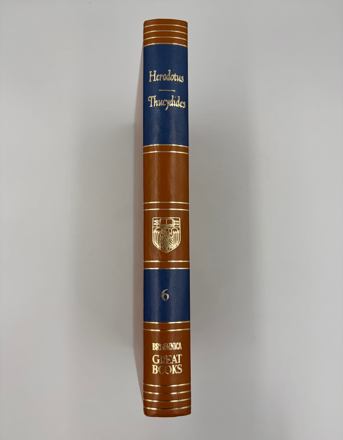 Hardcover elegant mid-century book spine view of 'The History of Herodotus and The History of the Peloponnesian War'. 