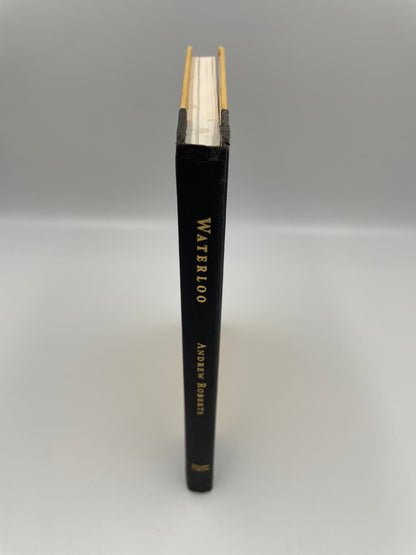 Book titled 'Waterloo' by Andrew Roberts on a gray background.