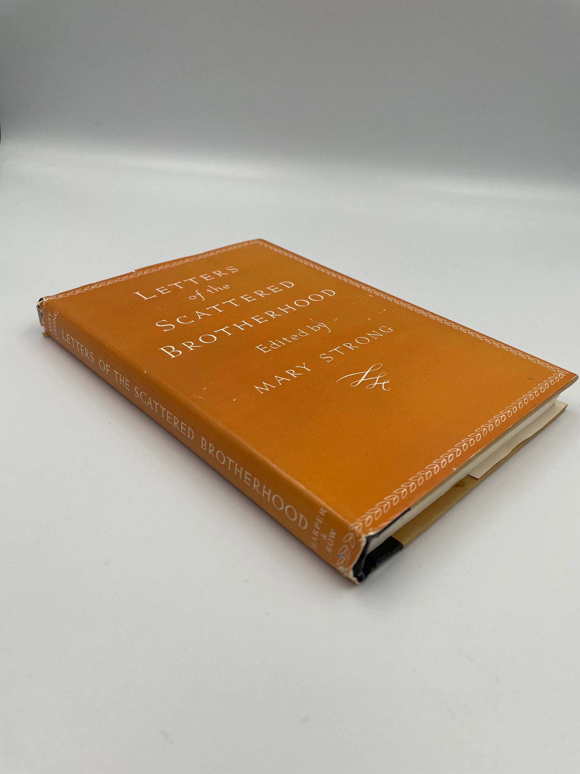 Book cover and spine view of ‘Letters of the Scattered Brotherhood’. Edited by Mary Strong‘with gold text on a white background.