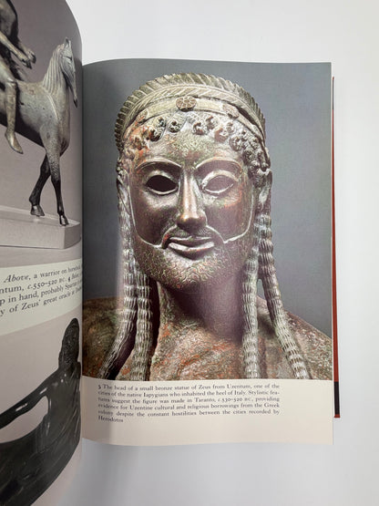 Illustration of a bronze head of Zeus from The Folio History of Ancient Greece: The Persian Wars. 