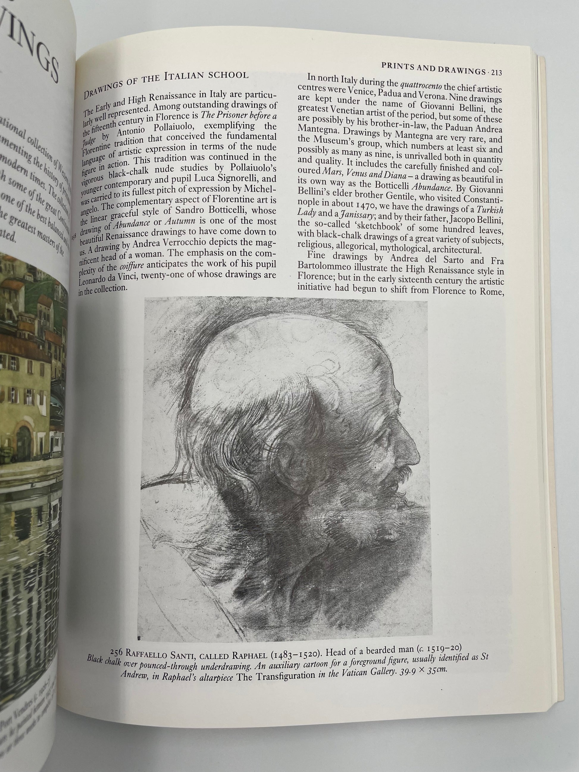 Open book with a black and white illustration of a head on a white background