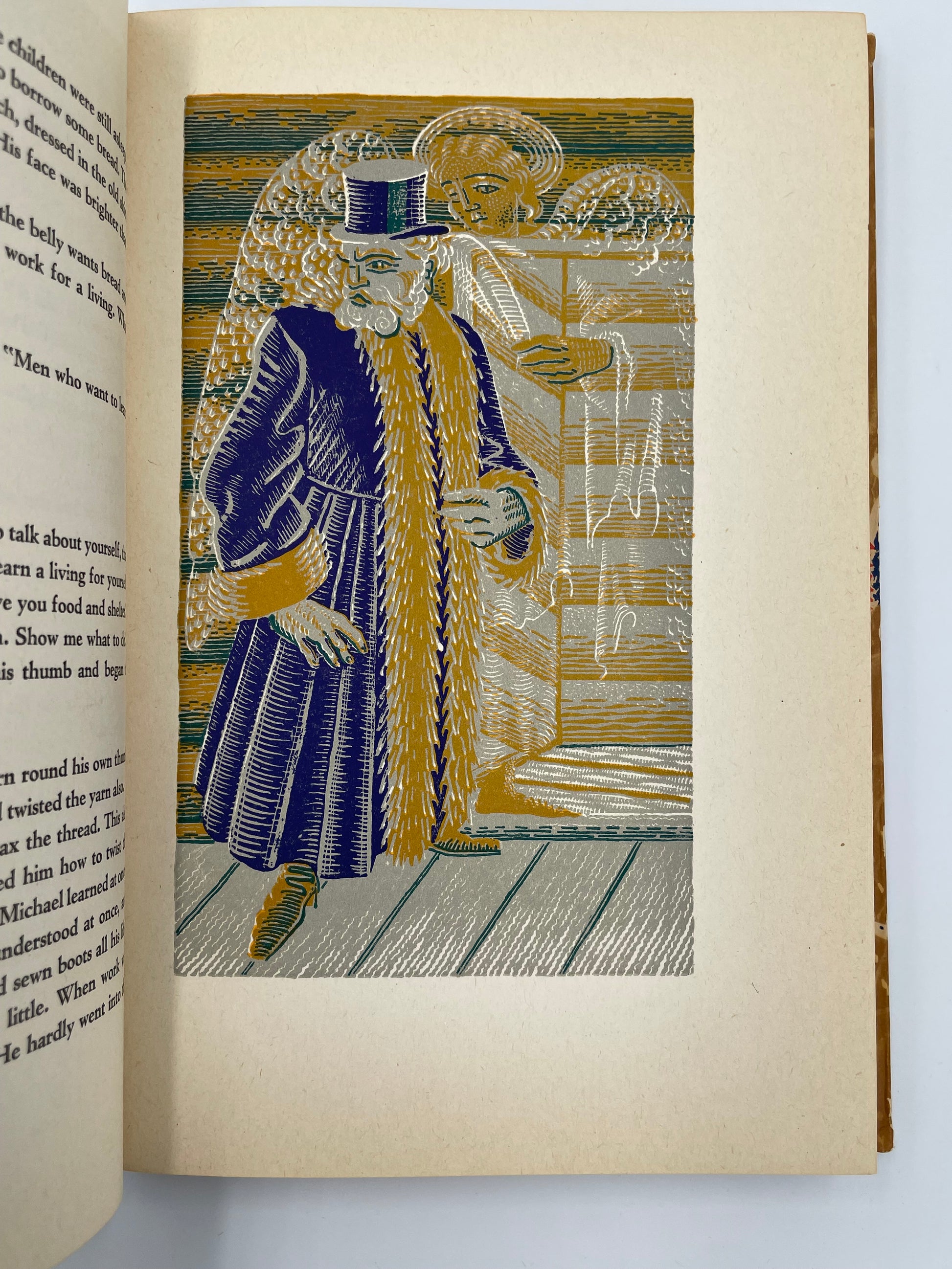 Page with illustration of a finally dressed man with a hat from ‘Tolstoy - Stories and Legends’.