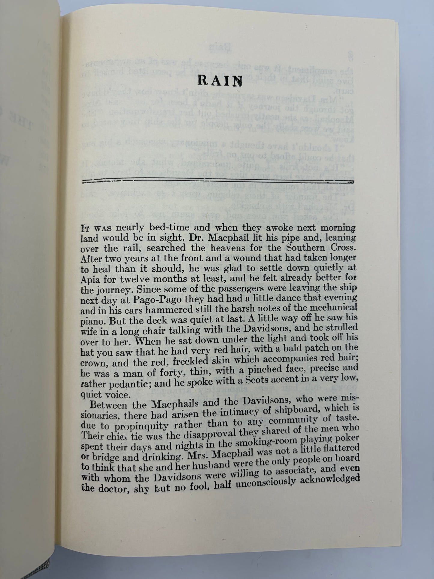 Open book with text from short story, 'The Rain' from 'The Complete Short Stories of W. Somerset Maugham' volume 1.