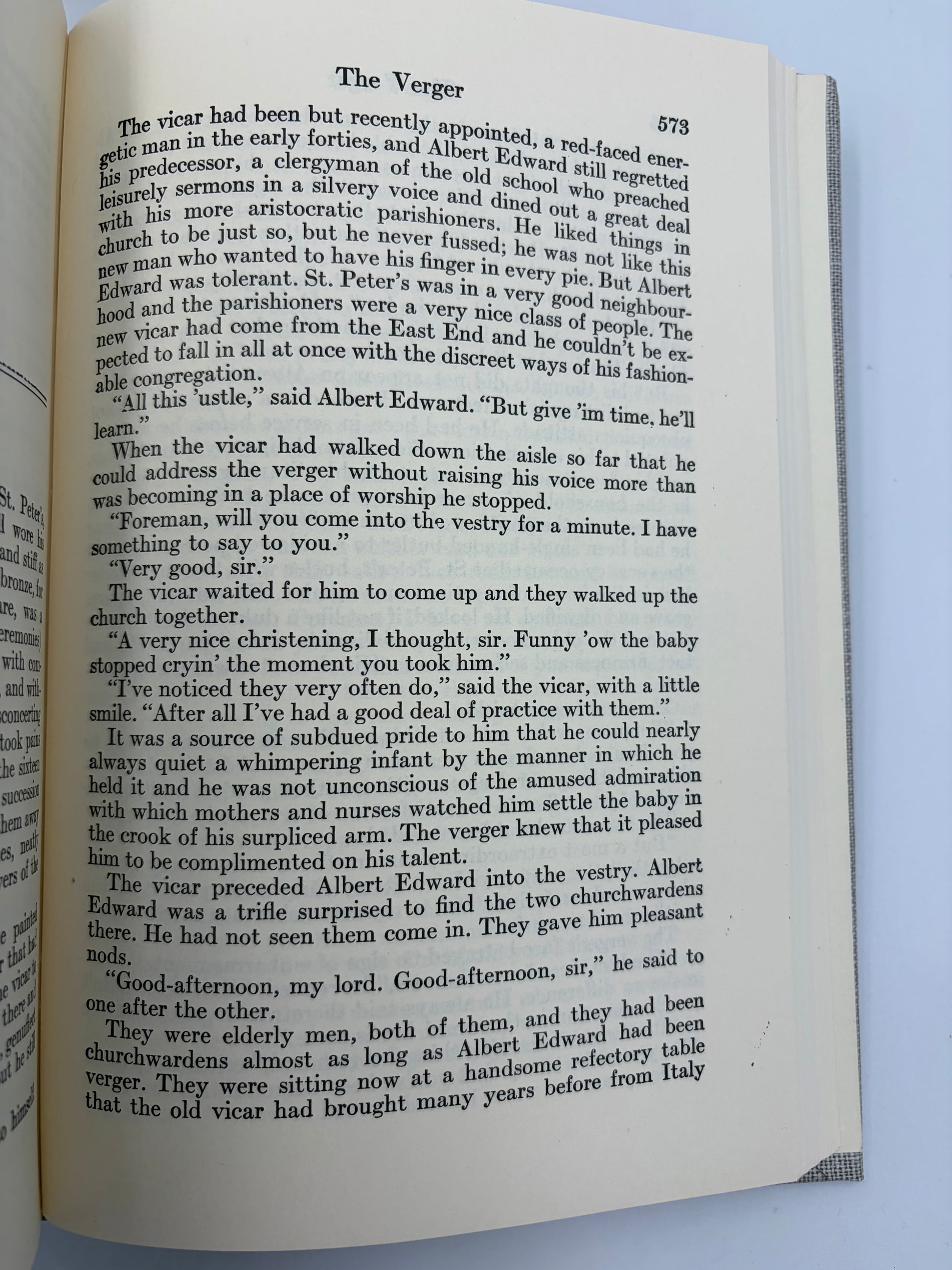 Open book with text (continued) from the short story 'The Verger' from Table of contents page from 'The Complete Short Stories of W. Somerset Maugham' Volume 2.