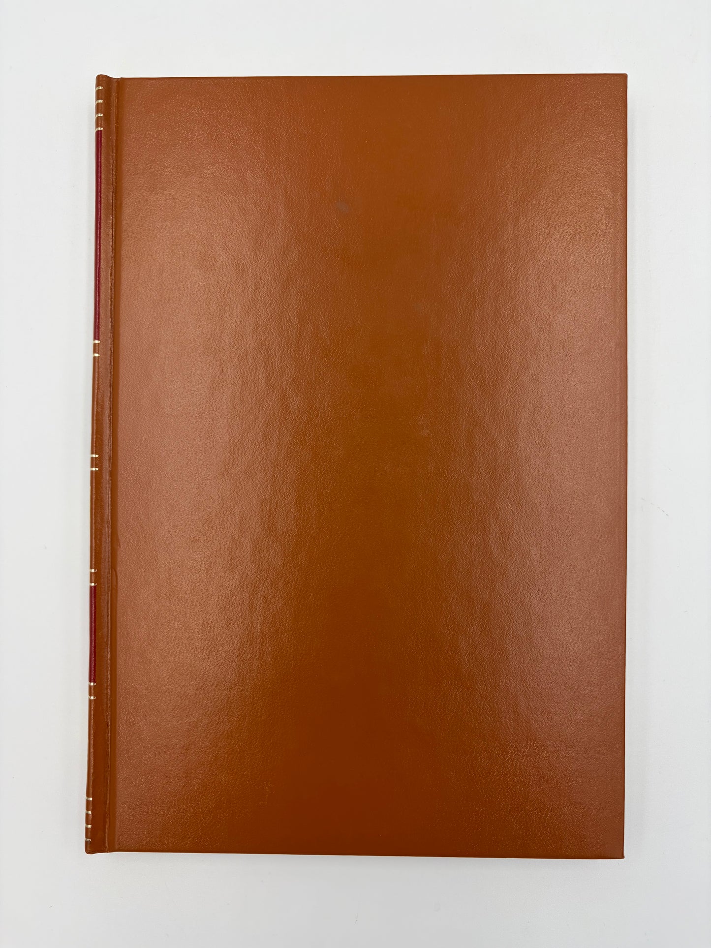 A brown leatherette-bound edition of 'Lucretius, Epictetus and Marcus Aurelius'.
