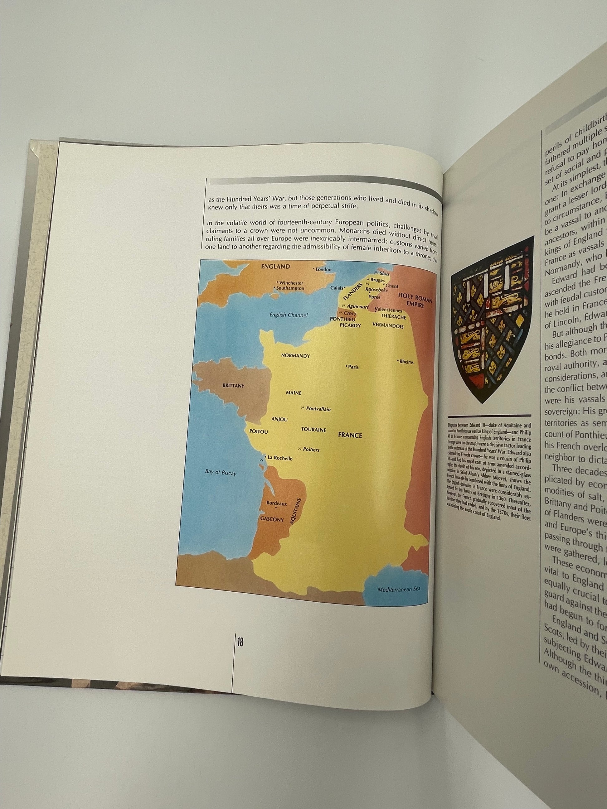 Inside page of book  'Time Frame A.D. 1300-1400' with a map and text on a white background