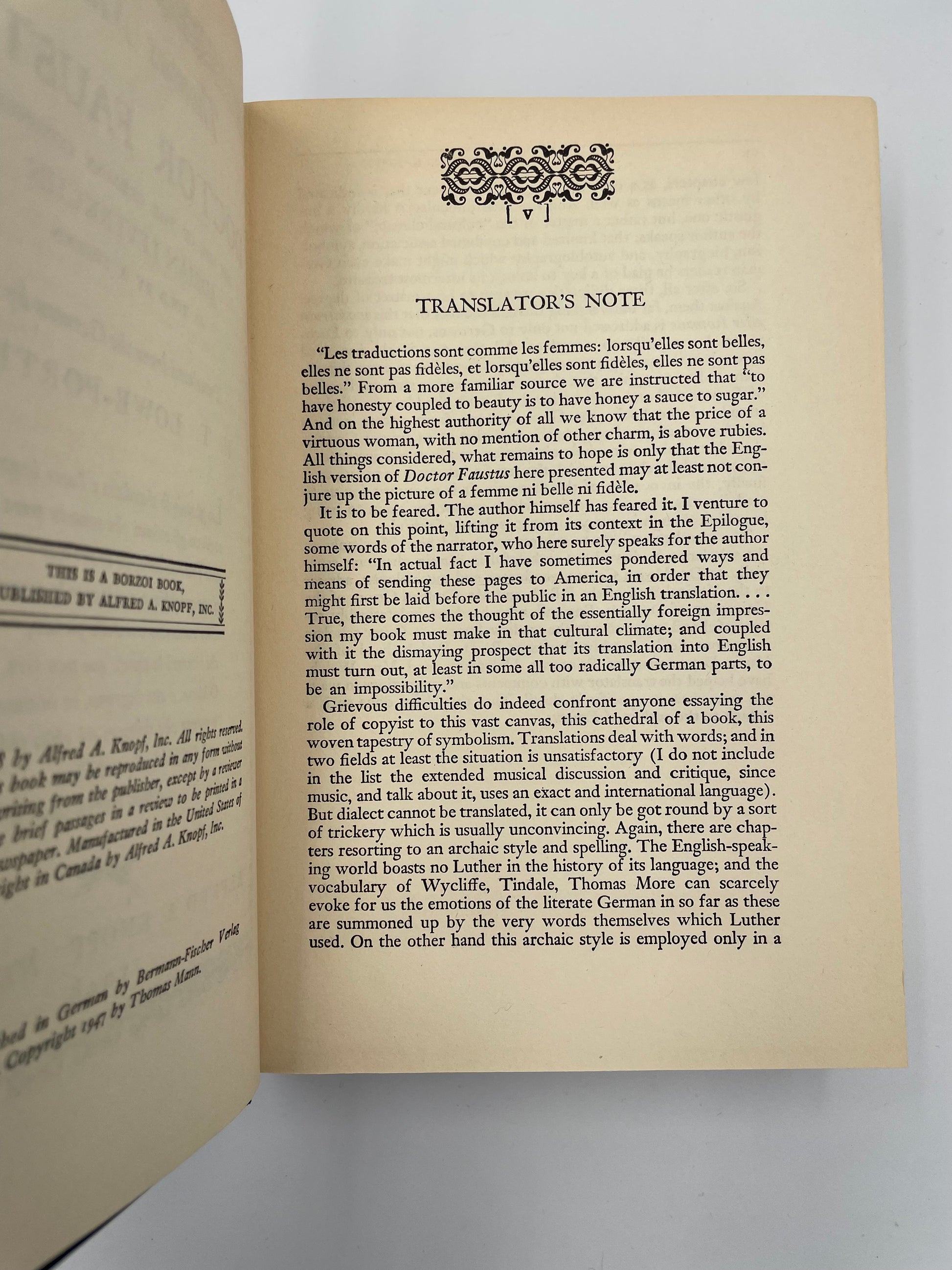 Open book with a translator's note on a white background from 'Doctor Faustus' by Thomas Mann.