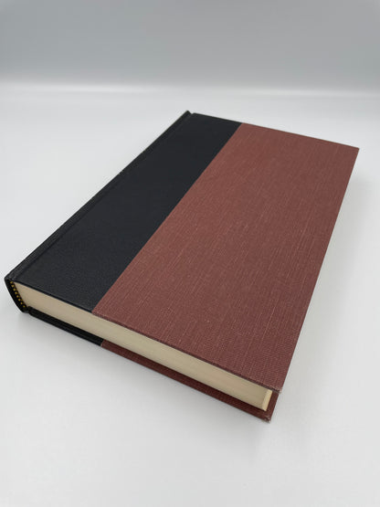 Plain cloth and leather cover of "Augustine. The Confessions. The City of God. On Christian Doctrine". 