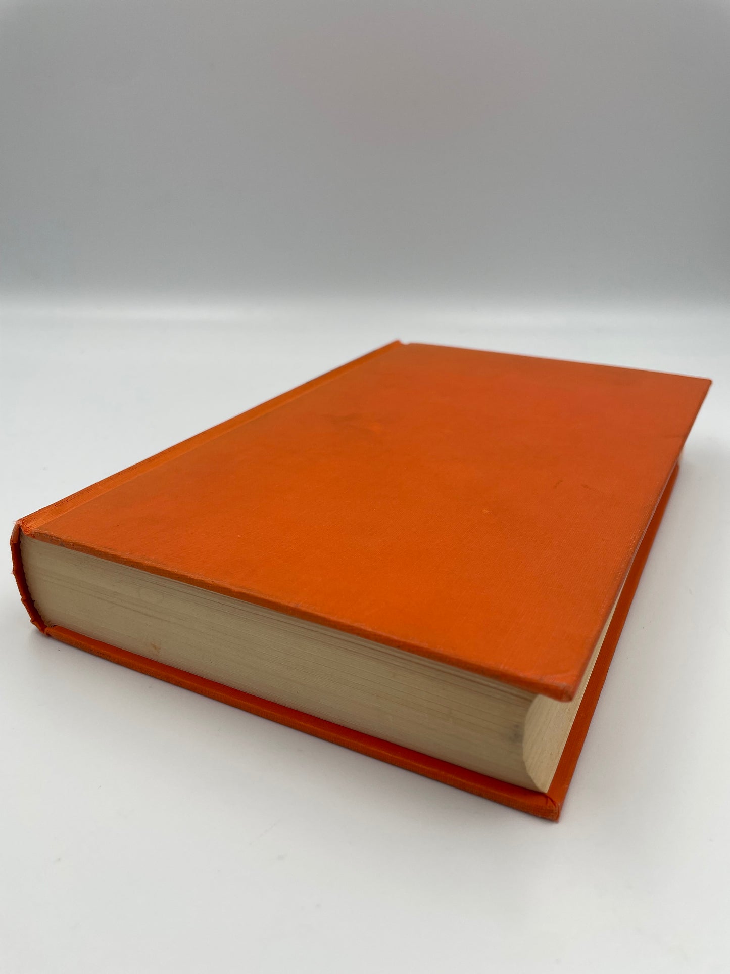 Orange book on a white background