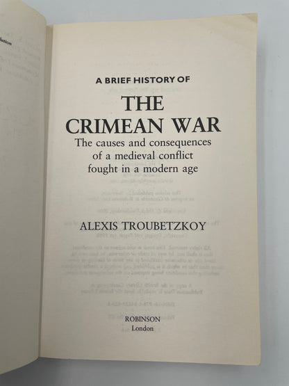 Book title page of 'A Brief History of the Crimean War' by Alexis Troubetzkoy on a gray background