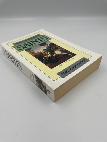 Book cover and spine view of ‘ The Oxford Dictionary of Saints’ by David Hugh Farmer