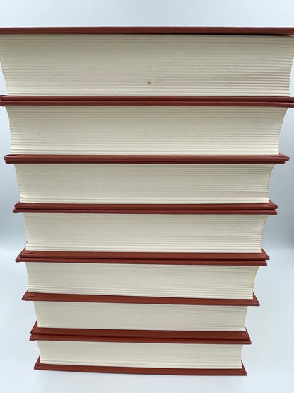 Books stacked with edges showing. 