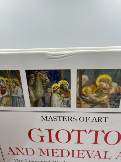 Detail of minor dent on cover of "Giotto and Medieval Art: The Lives and Works of the Medieval Artists".