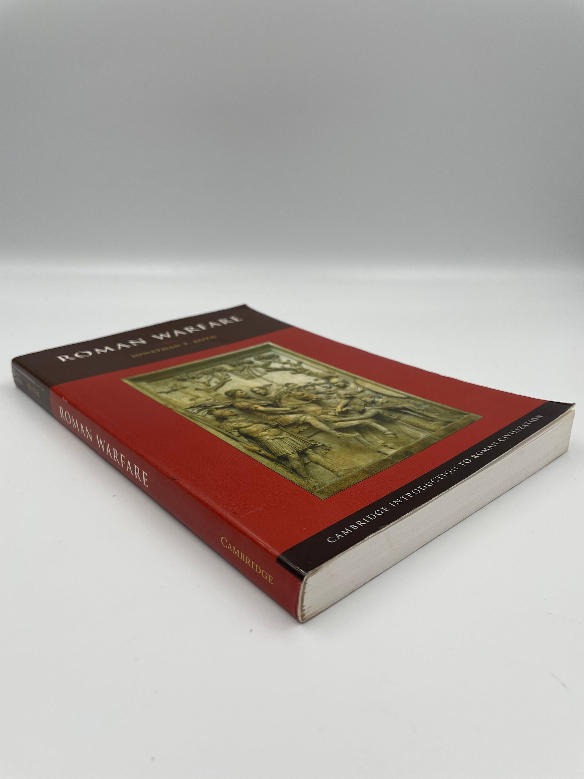 Book cover and spine view of ‘Roman Warfare’ by Jonathan P. Roth.