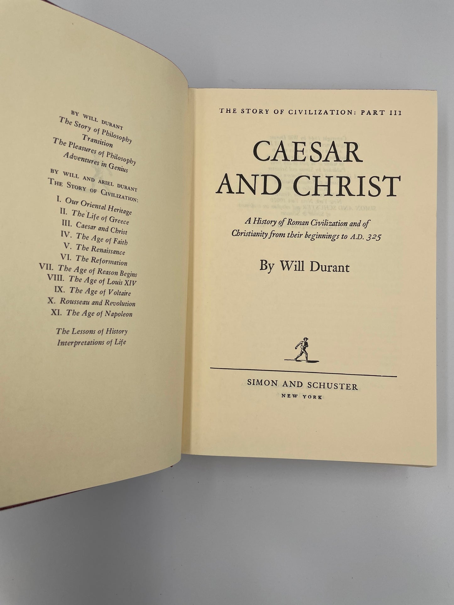 Open book titled 'Caesar and Christ' by Will Durant 