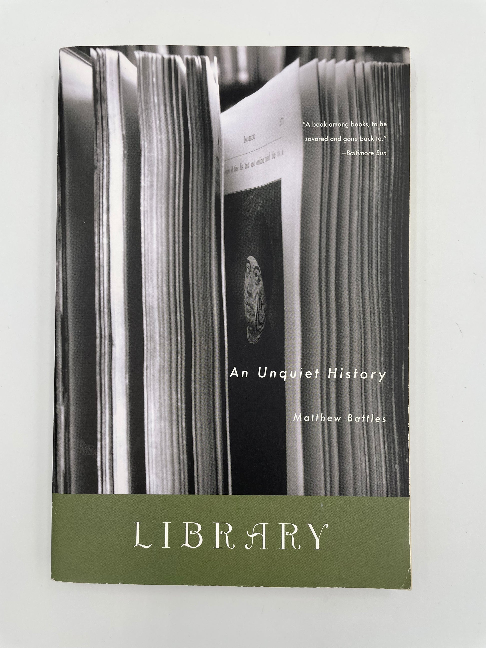 Book cover entitled 'Library: An Unquiet History' by Matthew Battles.