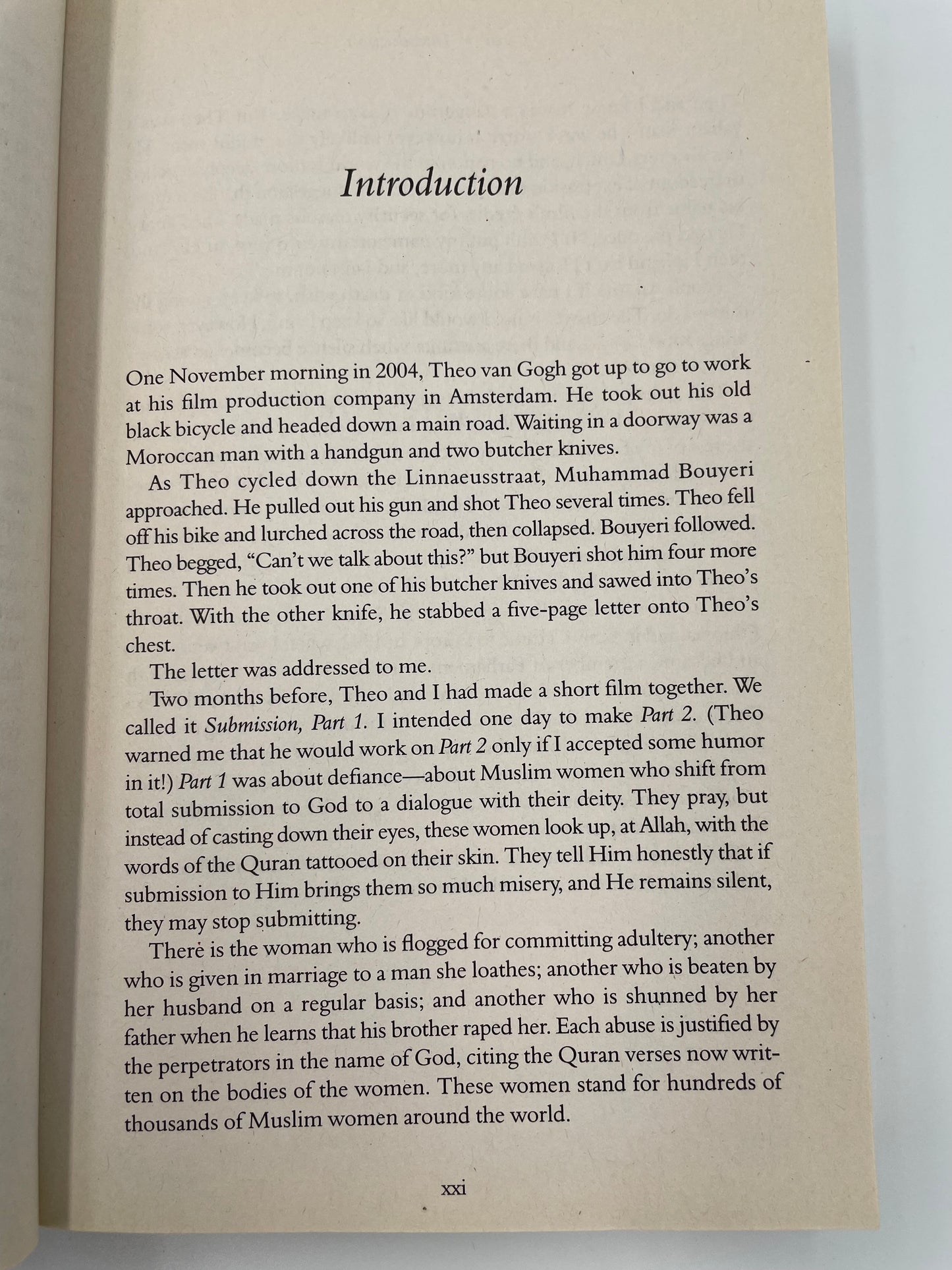 Book open to an introduction page with text from ‘Infidel’ by Ayaan Hirsi Ali..