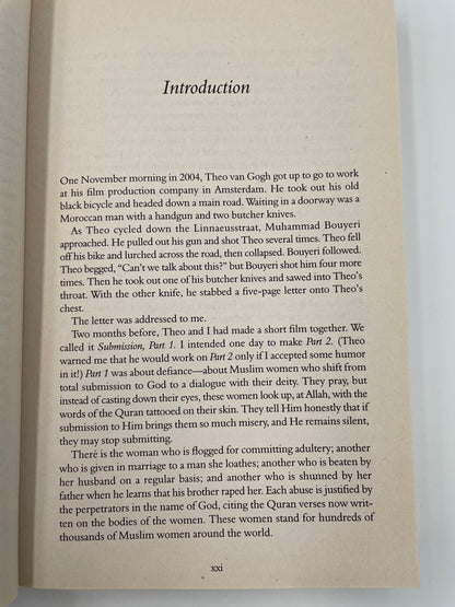 Book open to an introduction page with text from ‘Infidel’ by Ayaan Hirsi Ali..