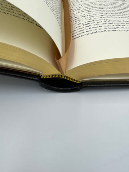 Detail of binding and silk fabric marker from "The Mill on the Floss" by George Elliot. (Easton Press)